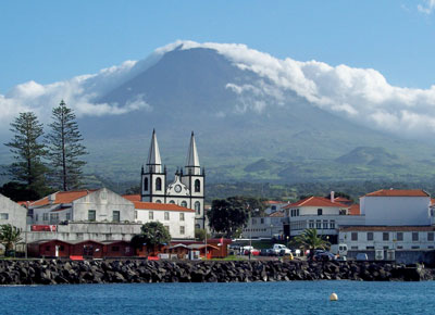 The Madalena waterfront with Pico Mountain rising into the clouds. Photo by Gail Keck