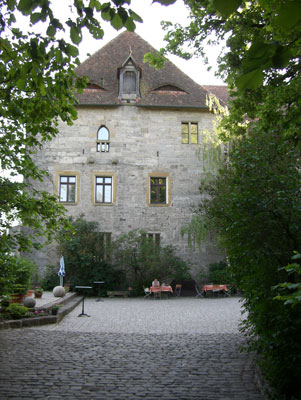 A view of the oldest part of Burg Colmberg. The tables and umbrellas were set outside the bar. Photo: Stallwitz