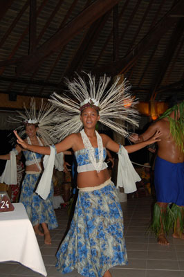 Dressed in traditional costume, Polynesian dancers gracefully performed during a lively dinner show.