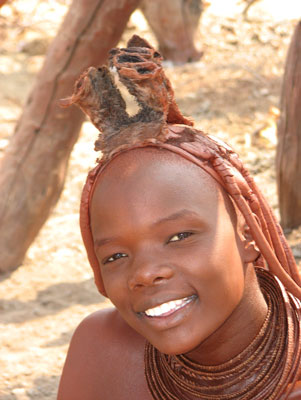 Himba woman wearing a headdress that indicates she’s married.