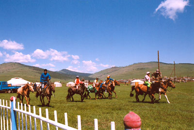 Horses going around the small stadium in Mungungarit.