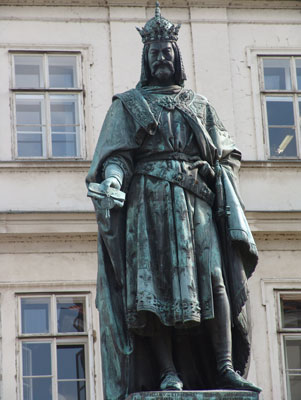 Bronze statue of Charles IV stands near the Old Town Bridge Tower.