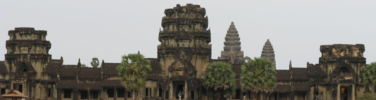 Afternoon crowds walking across the moat into Angkor Wat, Cambodia. 