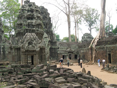 Giant fig trees have grown through the ruins of Ta Prohm Temple — Cambodia.