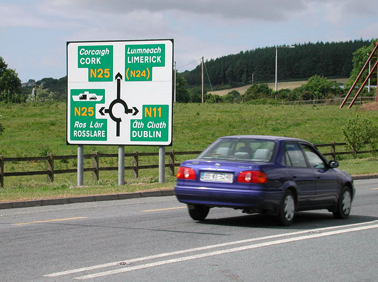 When approaching a roundabout in the British Isles, drivers often see a sign that charts the exits. Photo: Steves