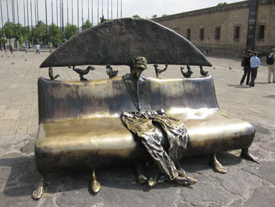 There’s plenty of room on Alejandro Colunga’s bronze chair near  Cabañas Hospice in Guadalajara’s historic district.