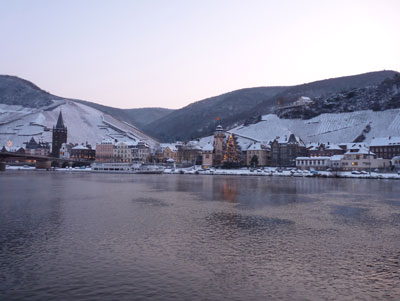 The charming town of Cochem under a light dusting of snow.