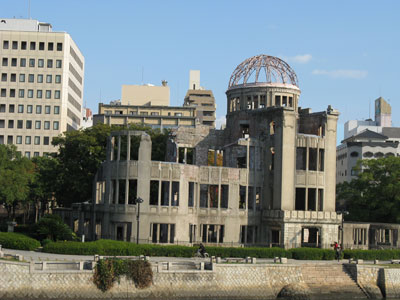 A ruined building, the Atomic Bomb Dome stands as a reminder of the force of the blast that leveled the city during World War II. 