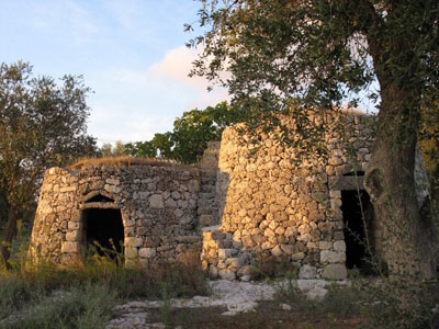 The small huts, or trulli, where farmers and their animals once lived.