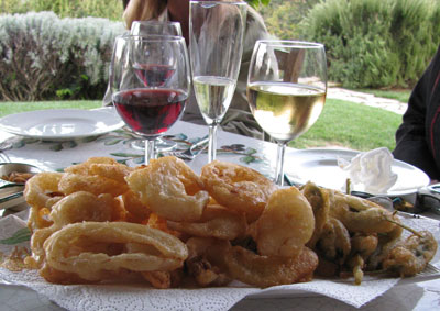 Crispy onion rings and deep-fried sage leaves.