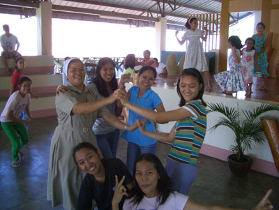 Sister Alma and the girls hiphop dancing after Mass. Photo: Graper