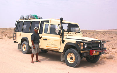 Our guide, Ricky Averia, and our tough Land Rover Defender.
