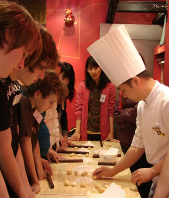 Chef placing pastry ball on waxed paper. Photos: Sandra Scott