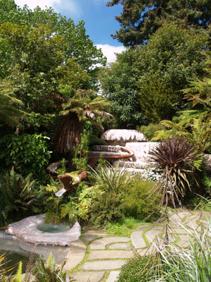 Water streams into a pool from the mouth of Moko Waiwera, the hot-water lizard, which winds through the Ora Garden of Well­being in Taupo, New Zealand. Photos: Horn