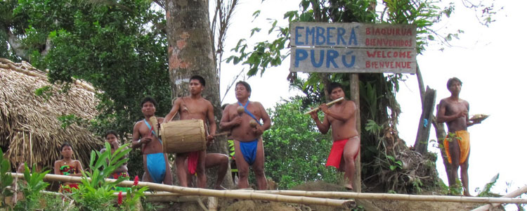 A small band of Emberá men singing and playing instruments made by hand served as a welcome committee.