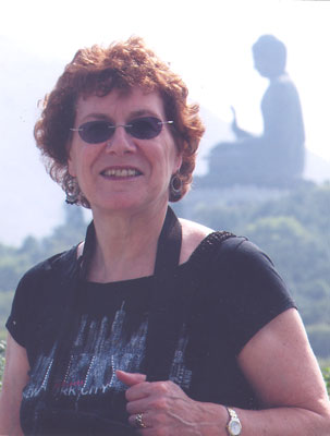 Arlene Lichtenstein and, in the background, the hilltop Tian Tan Buddha — Lantau Island.