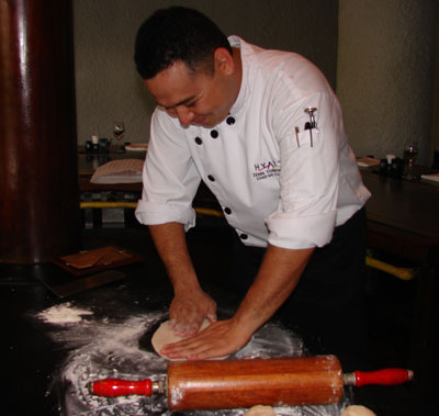 Chef Zenn making flat bread. 