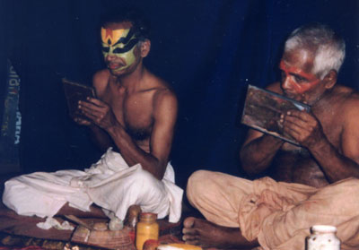 Kathakali performers applying makeup — Kochi Cultural Center. Photos: Wilson