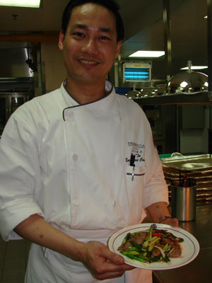 Chef Dicky with stir-fried duck.