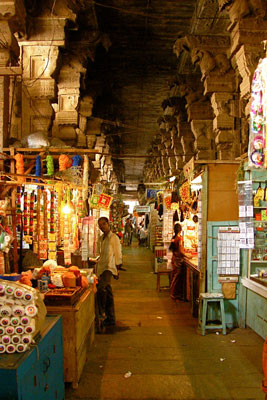 An aisle lined with shops in the Pudhu Mandapam in Madurai, India. Photo: Holt