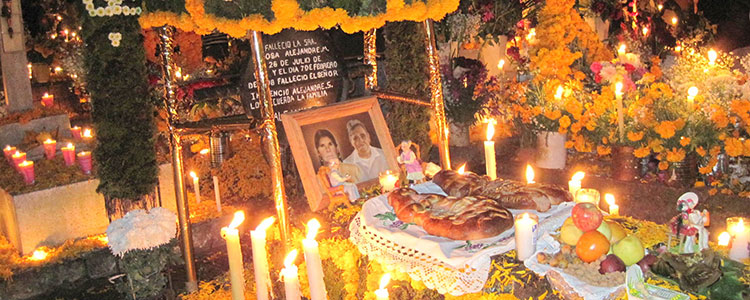 A grave decorated for the Night of the Dead celebration.