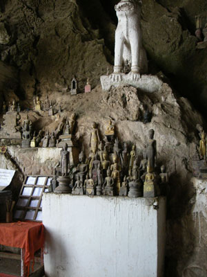 Some of the retired statues of Buddha brought to Pak Ou Cave over the centuries.