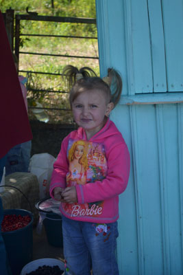 Young girl outside of Armenia’s Geghard Monastery, a UNESCO site.