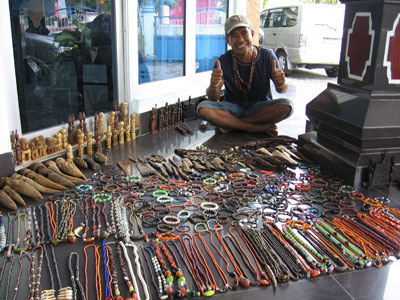 A vendor set up shop on the porch of the Elvin Hotel in Waingapu about 10 minutes after we checked in.