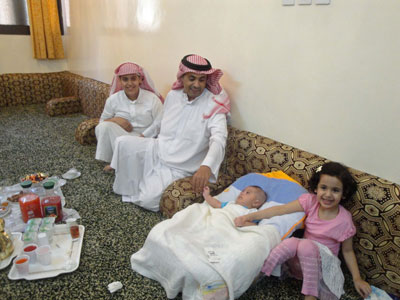 Khaled with his children at his home. Photo: Doris Neilson