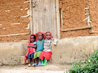 Children at the beginning of the trail to the Dian Fossey compound.