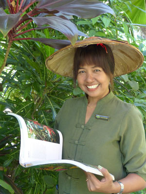 Khin Khin Soe with her horticulture book — Governor’s Residence, Yangon, Myanmar. Photos: Yvonne Horn