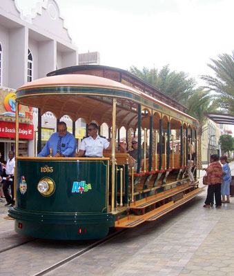 Oranjestad’s glistening new tram takes visitors around in style.