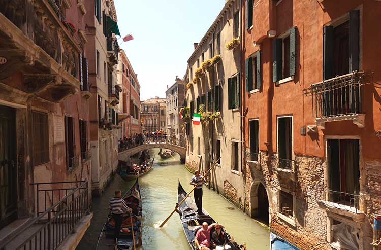 Smart travelers stay oriented, but in scenic cities such as Venice it’s fun to get lost. Photo by Dominic Bonuccelli