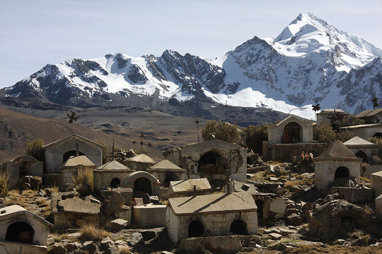 Cemetery of the Aymara, with graves dating back to the 1700s, backed by Chacaltaya Peak.