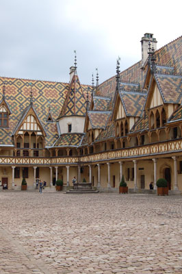 The Hôtel-Dieu in Beaune, a former hospital, now a museum, with its distinctive pattern of roof tiles common to Burgundy.