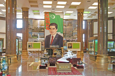 Turkmenistan President Berdimuhamedow smiles benignly in a massive photographic portrait in the rotunda of the National Museum of History in Ashgabat.