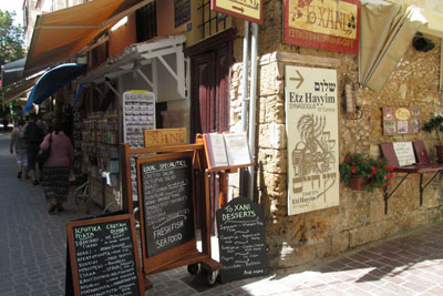 Restaurant menu boards in Greek and English in Chania.