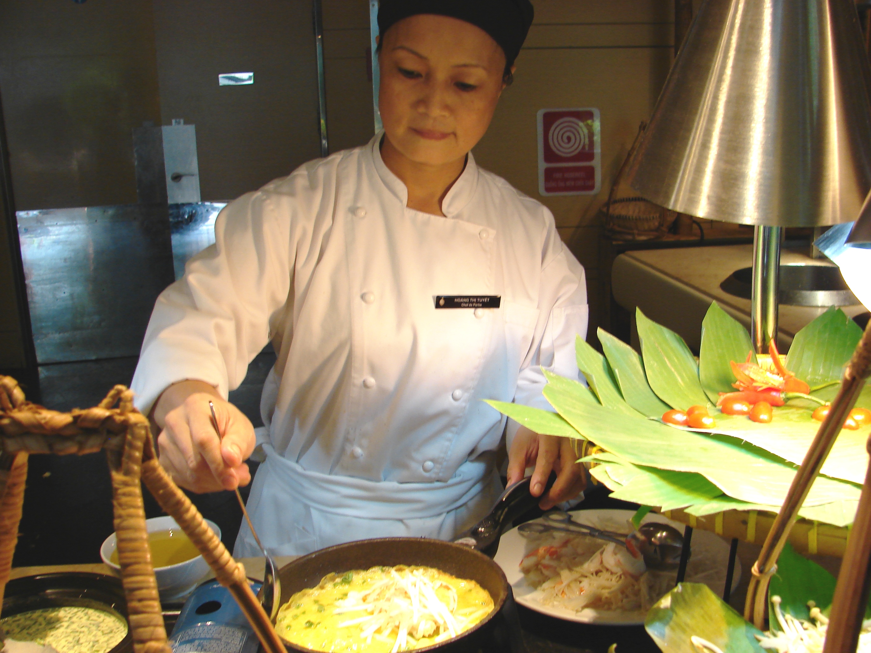 Chef Hoang Thi Tuyet cooking a pancake — Market 39 restaurant. Photo by Sandra Scott