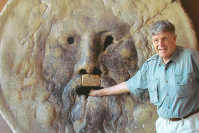 Robert Siebert testing the Bocca della Verità (Mouth of Truth) in Rome.