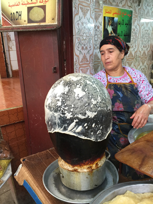 A woman making phyllo in Fez’s souk.