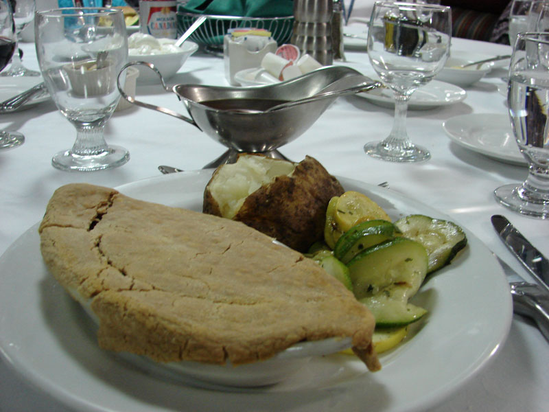 Tourtière served with a baked potato and a squash/zucchini medley. Photos by Sandra Scott