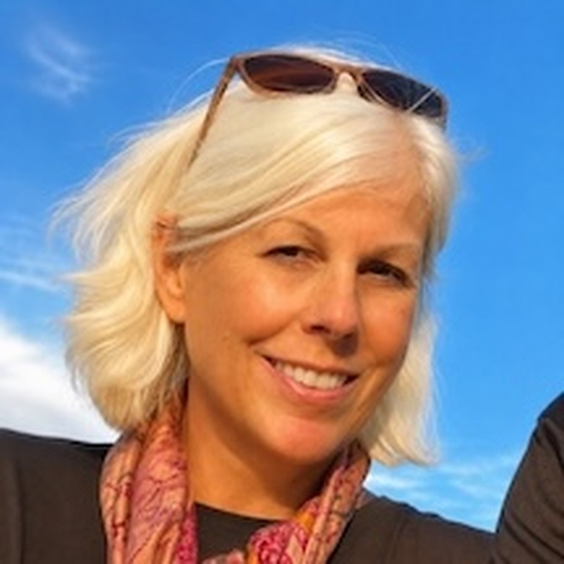 woman with sunglasses on her head