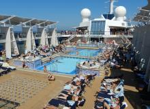 To avoid the worst cruise ship crowds, use amenities such as swimming pools during off-peak hours.