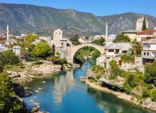 Mostar’s Old Bridge — a 21st century reconstruction of the 16th century original — is traditionally considered the point where East meets West.