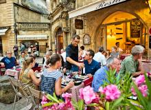 Lingering in outdoor cafes is the norm in France — eat long and well.