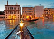 Though expensive, riding a gondola at night is one of the great experiences in Europe.