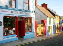 On the colorful streets of Dingle, you’ll hear a steady beat of Irish folk music ringing out through vibrant pubs like Dick Mack’s.