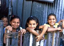 Taking an educational tour often means you’ll visit a struggling part of the world and engage with the locals — like these schoolchildren in El Salvador.