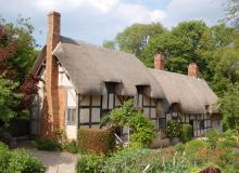 The thatched roof of Anne Hathaway’s Cottage, where Shakespeare’s wife grew up, seems to drip over the 500-year-old building.