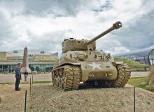 A Sherman tank guards the approach to the Utah Beach Landing Museum in Normandy, France. Photo by Dominic Arizona Bonuccelli